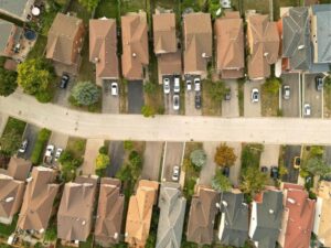 Aerial view of neighboring residential properties with driveways and access areas that may require review through an ALTA survey.